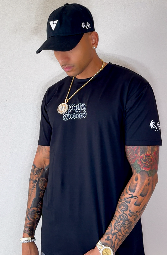 VG HIGHLY FAVORED . TEE